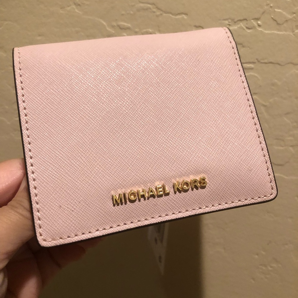 Michael Kors light pink leather wallet